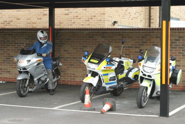 Tom looking at police bikes